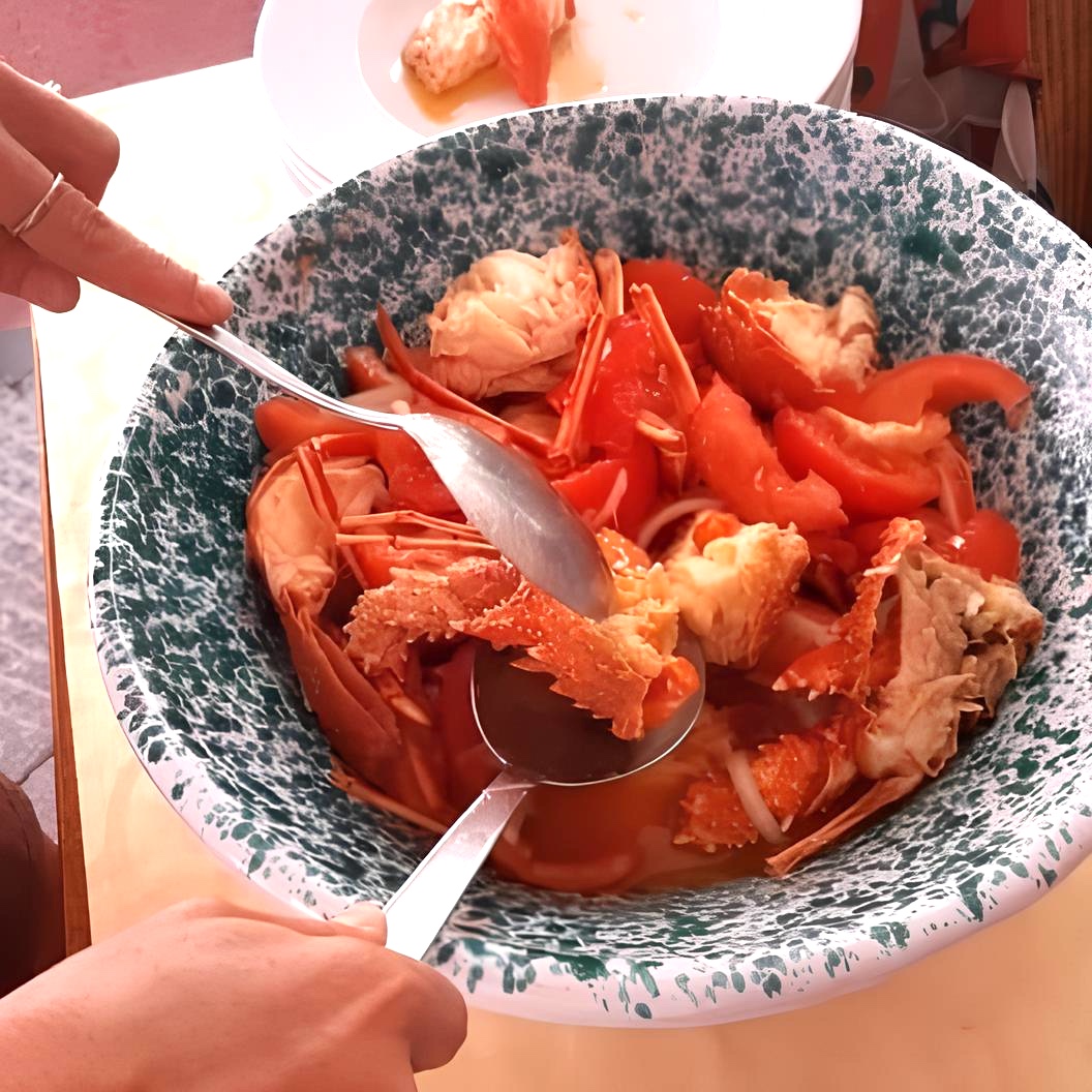 Entrante de calamares con tomatitos — Restaurante La Grotta La Maddalena